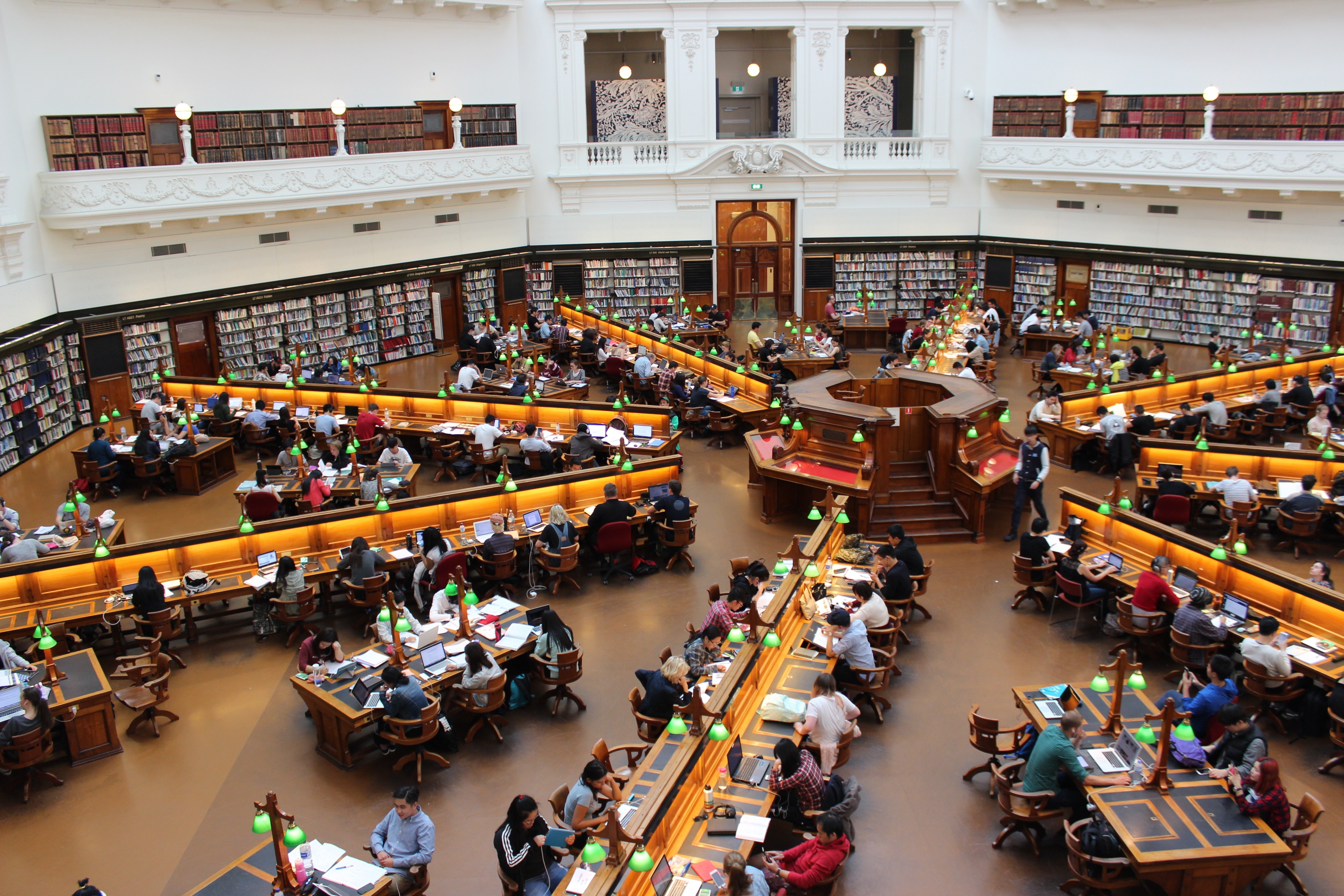 Students studying in a crowded library